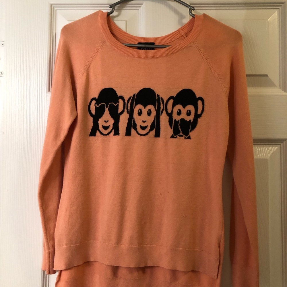 Pink monkey emoji sweater